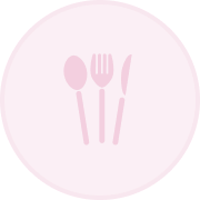 a circular logo with a spoon fork and knife