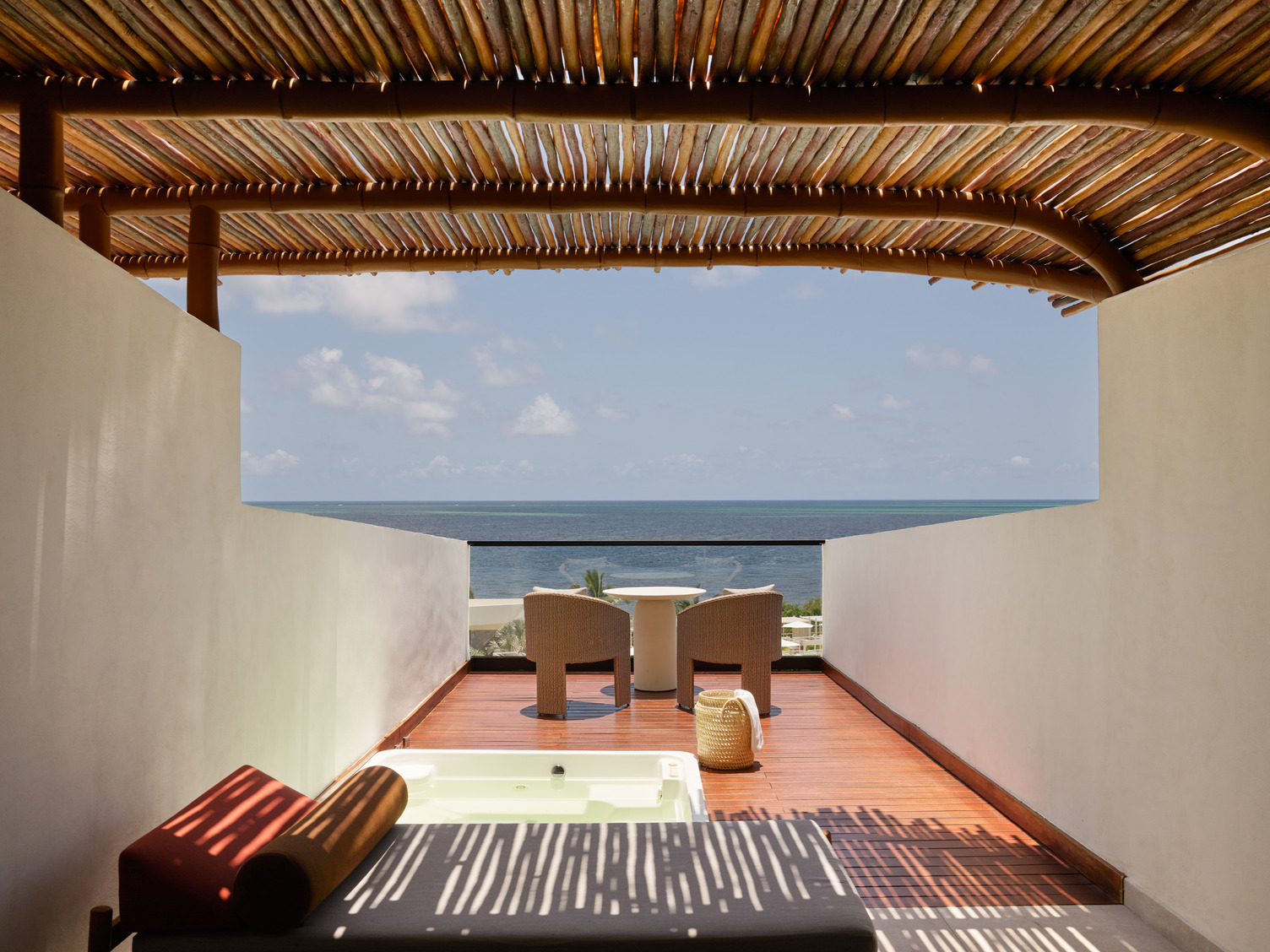 a deck with a view of the ocean